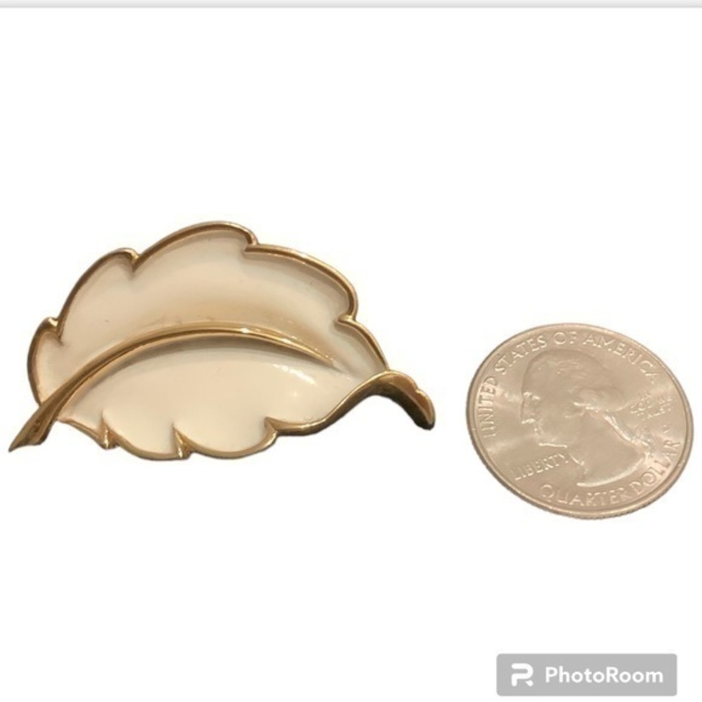 - Monet gold tone enamel leaf brooch